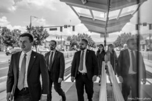 (Trent Nelson  |  The Salt Lake Tribune) Transportation Secretary Pete Buttigieg walks to the Jackson/Euclid station TRAX station in Salt Lake City on Friday, July 29, 2022.