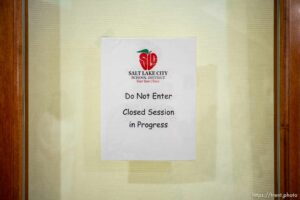 (Trent Nelson  |  The Salt Lake Tribune) A sign indicates that the Salt Lake City School District Board is in a closed session on Tuesday, Aug. 2, 2022.