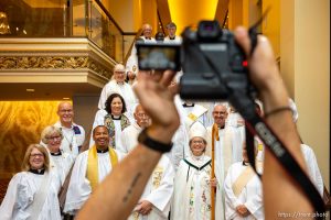 (Trent Nelson  |  The Salt Lake Tribune) Bishop Phyllis Spiegel poses for a photograph with other members of the clergy. The Episcopal Diocese of Utah ordains and consecrates the Rev. Phyllis Spiegel as the 12th bishop of Utah at the Capitol Theatre in Salt Lake City on Saturday, Sept. 17, 2022.