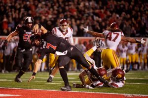 (Trent Nelson  |  The Salt Lake Tribune) Utah Utes quarterback Cameron Rising (7) scores a touchdown on a two-point conversion, to win the game, as the University of Utah hosts USC, NCAA football in Salt Lake City on Saturday, Oct. 15, 2022.