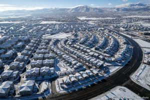 (Trent Nelson  |  The Salt Lake Tribune) Fresh snow on homes in Herriman on Thursday, Dec. 8, 2022.