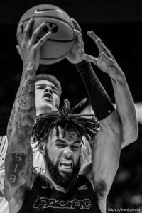 (Trent Nelson  |  The Salt Lake Tribune) Brigham Young Cougars forward Noah Waterman (0) defending Pacific Tigers guard Donovan Williams (1) as BYU hosts Pacific, NCAA basketball in Provo on Saturday, Feb. 4, 2023.