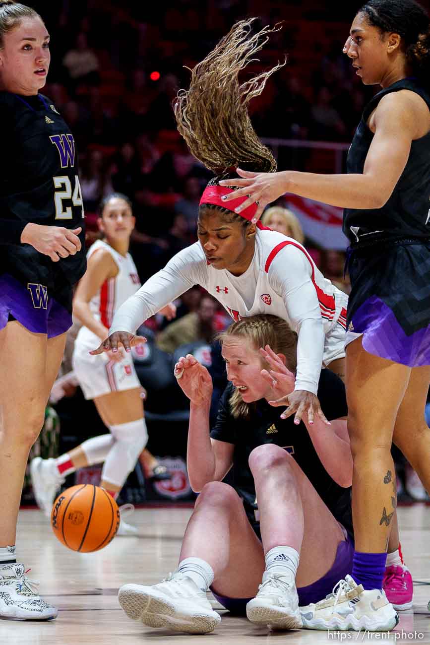 (Trent Nelson  |  The Salt Lake Tribune) Utah Utes forward Dasia Young (34) and Washington Huskies center Darcy Rees (53) as Utah hosts Washington, NCAA basketball in Salt Lake City on Friday, Feb. 10, 2023.