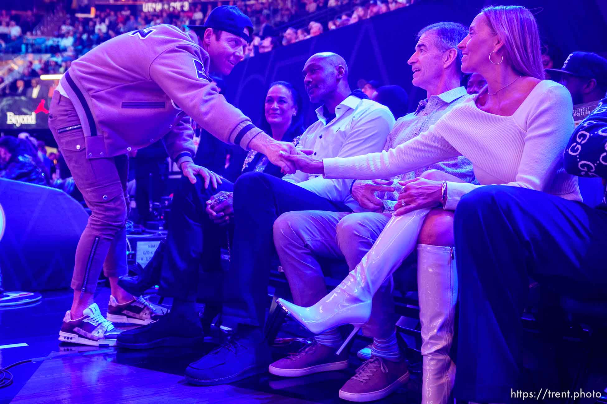 (Trent Nelson  |  The Salt Lake Tribune) Utah Jazz owner Ryan Smith greets Karl Malone and John Stockton courtside at the NBA All-Star game in Salt Lake City on Sunday, Feb. 19, 2023. From left are Smith, Kay Malone, Malone, Stockton, and Nada Stockton.