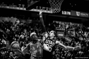 (Trent Nelson  |  The Salt Lake Tribune) Utah Jazz forward Juan Toscano-Anderson (95) defending San Antonio Spurs guard Devonte' Graham (4) as the Utah Jazz host the San Antonio Spurs, NBA basketball in Salt Lake City on Saturday, Feb. 25, 2023.