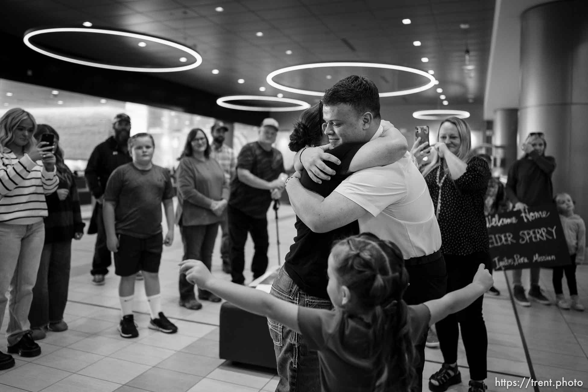 (Trent Nelson  |  The Salt Lake Tribune) Family members gather at Salt Lake International Airport to welcome Latter-day Saint missionary Kaysen Sperry home from a two-year mission to Peru, on Tuesday, Oct. 3, 2023.
