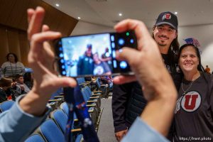 (Trent Nelson  |  The Salt Lake Tribune) Utah quarterback Cam Rising poses for photos with faculty and students at Eastmont Middle School in Sandy on Tuesday, Nov. 28, 2023.