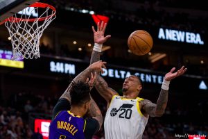 (Trent Nelson  |  The Salt Lake Tribune) Los Angeles Lakers guard D'Angelo Russell (1) and Utah Jazz forward John Collins (20) as the Utah Jazz host the Los Angeles Lakers, NBA basketball in Salt Lake City on Saturday, Jan. 13, 2024.