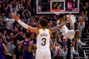(Trent Nelson  |  The Salt Lake Tribune) Utah Jazz guard Keyonte George (3) celebrates as Utah Jazz guard Collin Sexton (2) dunks the ball late in the fourth quarter as the Utah Jazz host the Los Angeles Lakers, NBA basketball in Salt Lake City on Saturday, Jan. 13, 2024.