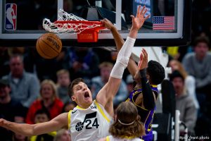 (Trent Nelson  |  The Salt Lake Tribune) Los Angeles Lakers forward Rui Hachimura (28) dunks over Utah Jazz center Walker Kessler (24) as the Utah Jazz host the Los Angeles Lakers, NBA basketball in Salt Lake City on Saturday, Jan. 13, 2024.