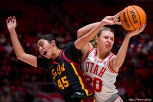 (Trent Nelson  |  The Salt Lake Tribune) Utah Utes forward Reese Ross (20) pulls the rebound away from USC Trojans guard Kayla Padilla (45) as Utah hosts USC, NCAA basketball in Salt Lake City on Friday, Jan. 19, 2024.