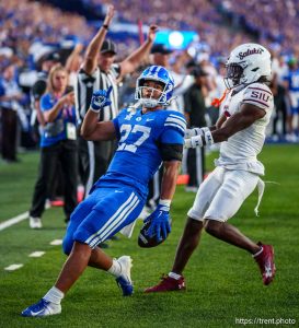 (Trent Nelson  |  The Salt Lake Tribune) Brigham Young Cougars running back LJ Martin (27) celebrates a touchdown as BYU hosts Southern Illinois, NCAA football in Provo on Saturday, Aug. 31, 2024.