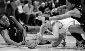 (Trent Nelson  |  The Salt Lake Tribune)  Utah Utes guard Grace Foster (10) dives for a loose ball as Utah hosts Arizona State, NCAA basketball in Salt Lake City on Saturday, Dec. 21, 2024.