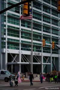 (Trent Nelson  |  The Salt Lake Tribune) A 50501 protester walks past the Wallace F. Bennett Federal Building in Salt Lake City on Tuesday, March 4, 2025.