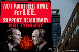 (Trent Nelson  |. The Salt Lake Tribune) A digital sign depicts Sen. Mike Lee and Russian President Vladimir Putin in downtown Salt Lake City on Wednesday, March 5, 2025.
