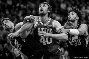 (Trent Nelson  |  The Salt Lake Tribune) Utah Jazz center Micah Potter (25), Boston Celtics center Luke Kornet (40) and Utah Jazz guard Johnny Juzang (33) as the Utah Jazz host the Boston Celtics, NBA basketball in Salt Lake City on Friday, March 21, 2025.