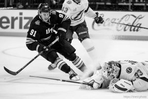(Trent Nelson  |  The Salt Lake Tribune) Utah Hockey Club right wing Josh Doan (91) comes to a stop as Tampa Bay Lightning goaltender Brandon Halverson knocks the puck away as Utah Hockey Club hosts the Tampa Bay Lightning, NHL hockey at the Delta Center in Salt Lake City on Saturday, March 22, 2025.