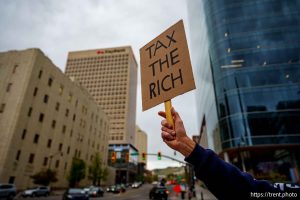 (Trent Nelson  |  The Salt Lake Tribune) People gather at the Wallace F. Bennett Federal Building to protest, in Salt Lake City on Wednesday, April 16, 2025.