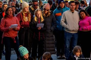 (Trent Nelson  |  The Salt Lake Tribune) People sing a hymn at Crossroads Urban Center, the third station of the annual Good Friday procession in Salt Lake City on Friday, April 18, 2025.