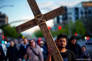 (Trent Nelson  |  The Salt Lake Tribune) Albin Matthew carries the cross in the annual Good Friday procession in Salt Lake City on Friday, April 18, 2025.