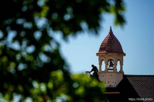 (Trent Nelson  |  The Salt Lake Tribune) A worker near the cupola on the Holy Cross Hospital Chapel in Salt Lake City on Wednesday, May 7, 2025.
