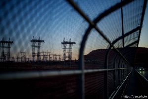 (Trent Nelson  |  The Salt Lake Tribune) Transmission towers near Glen Canyon Dam in Page, Ariz., on Monday, May 19, 2025.