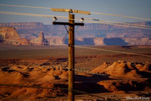 (Trent Nelson  |  The Salt Lake Tribune) Power lines near Lake Powell and Glen Canyon Dam in Page, Ariz., on Monday, May 19, 2025.