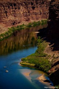 (Trent Nelson  |  The Salt Lake Tribune) Rafts on the Colorado River as seen from Navajo Bridge in Ariz. on Tuesday, May 20, 2025.