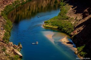 (Trent Nelson  |  The Salt Lake Tribune) Rafts on the Colorado River as seen from Navajo Bridge in Ariz. on Tuesday, May 20, 2025.