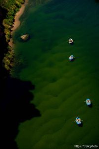 (Trent Nelson  |  The Salt Lake Tribune) Rafts on the Colorado River as seen from Navajo Bridge in Ariz. on Tuesday, May 20, 2025.