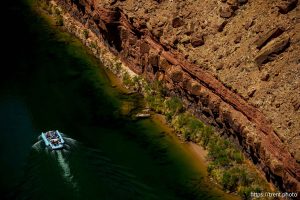 (Trent Nelson  |  The Salt Lake Tribune) Rafts on the Colorado River as seen from Navajo Bridge in Ariz. on Tuesday, May 20, 2025.