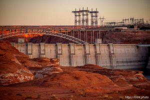 (Trent Nelson  |  The Salt Lake Tribune) Glen Canyon Dam and high-voltage transmission towers in Page, Ariz. on Tuesday, May 20, 2025.