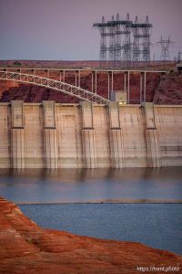 (Trent Nelson  |  The Salt Lake Tribune) Glen Canyon Dam and high-voltage transmission towers in Page, Ariz. on Tuesday, May 20, 2025.
