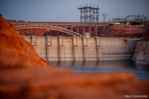 (Trent Nelson  |  The Salt Lake Tribune) Glen Canyon Dam and high-voltage transmission towers in Page, Ariz. on Tuesday, May 20, 2025.