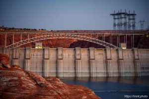 (Trent Nelson  |  The Salt Lake Tribune) Glen Canyon Dam and high-voltage transmission towers in Page, Ariz. on Tuesday, May 20, 2025.
