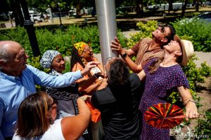 (Trent Nelson  |  The Salt Lake Tribune) Mayor Erin Mendenhall and members of the Salt Lake City Council join Betty Sawyer in raising the Juneteenth flag at City Hall in Salt Lake City on Tuesday, June 10, 2025.