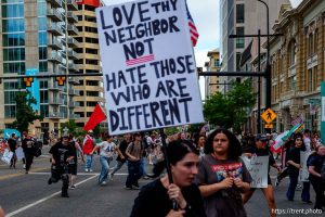 (Trent Nelson | The Salt Lake Tribune) People run after three shots were fired during 'No Kings' protest march in Salt Lake City, Saturday, June 14, 2025.