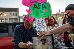 (Trent Nelson  |  The Salt Lake Tribune) Friends and family at the makeshift memorial for Arthur Folasa Ah Loo near the spot where he was killed during a 'No Kings' march on State Street in Salt Lake City on Wednesday, June 18, 2025.