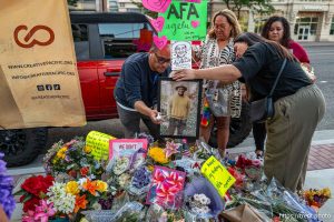 (Trent Nelson  |  The Salt Lake Tribune) Friends and family at the makeshift memorial for Arthur Folasa Ah Loo near the spot where he was killed during a 'No Kings' march on State Street in Salt Lake City on Wednesday, June 18, 2025.