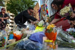 (Trent Nelson  |  The Salt Lake Tribune) Friends and family at the makeshift memorial for Arthur Folasa Ah Loo near the spot where he was killed during a 'No Kings' march on State Street in Salt Lake City on Wednesday, June 18, 2025.