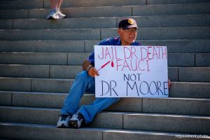 (Trent Nelson  |  The Salt Lake Tribune) People gather in support of Dr. Michael Kirk Moore Jr. in front of the Orrin G. Hatch U.S. Courthouse in Salt Lake City on Friday, July 11, 2025.