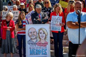 (Trent Nelson  |  The Salt Lake Tribune) Gayle Ruzicka, Phil Lyman and others bow their heads for the closing prayer as people gather in support of Dr. Michael Kirk Moore Jr. in front of the Orrin G. Hatch U.S. Courthouse in Salt Lake City on Friday, July 11, 2025.