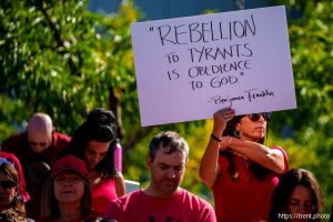 (Trent Nelson  |  The Salt Lake Tribune) 
closing prayer as people gather in support of Dr. Michael Kirk Moore Jr. in front of the Orrin G. Hatch U.S. Courthouse in Salt Lake City on Friday, July 11, 2025.