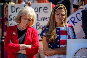 (Trent Nelson  |  The Salt Lake Tribune) Gayle Ruzicka and others bow their heads for the closing prayer as people gather in support of Dr. Michael Kirk Moore Jr. in front of the Orrin G. Hatch U.S. Courthouse in Salt Lake City on Friday, July 11, 2025.
