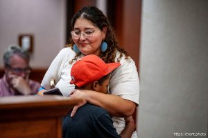 (Trent Nelson  |  The Salt Lake Tribune) Susan Cissoko and her son Sylvain as the Utah County Commission hears public comment on a proposed agreement with ICE, in Provo on Wednesday, July 16, 2025.