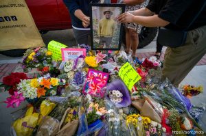 (Trent Nelson  |  The Salt Lake Tribune) Friends and family at the makeshift memorial for Arthur Folasa Ah Loo near the spot where he was killed during a 'No Kings' march on State Street in Salt Lake City on Wednesday, June 18, 2025.