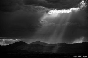 (Trent Nelson  |  The Salt Lake Tribune) clouds at sunset over the Bingham Copper Mine, and planes Draper on Wednesday, July 9, 2025.