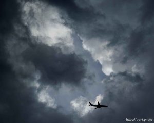(Trent Nelson  |  The Salt Lake Tribune) clouds at sunset over the Bingham Copper Mine, and planes Draper on Wednesday, July 9, 2025.