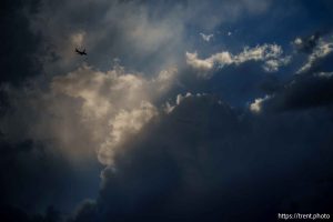 (Trent Nelson  |  The Salt Lake Tribune) clouds at sunset over the Bingham Copper Mine, and planes Draper on Wednesday, July 9, 2025.