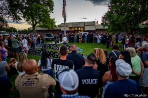 (Trent Nelson  |  The Salt Lake Tribune) A vigil is held in Tremonton on Tuesday, Aug. 19, 2025 to honor two city police officers who were killed and a sheriff’s deputy who was wounded two days earlier in a shooting.